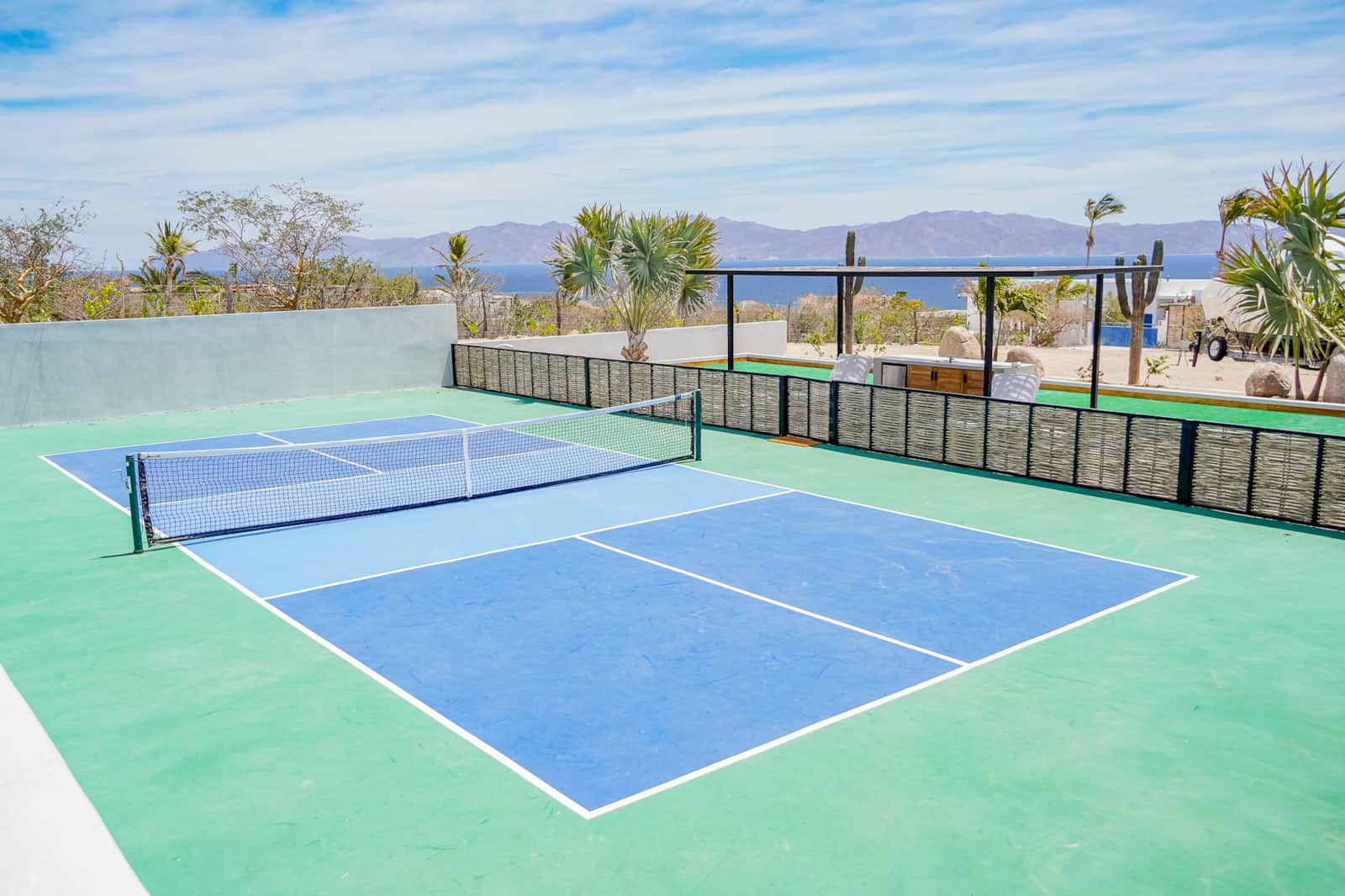 private pickleball court and bocce area at casa yamasan